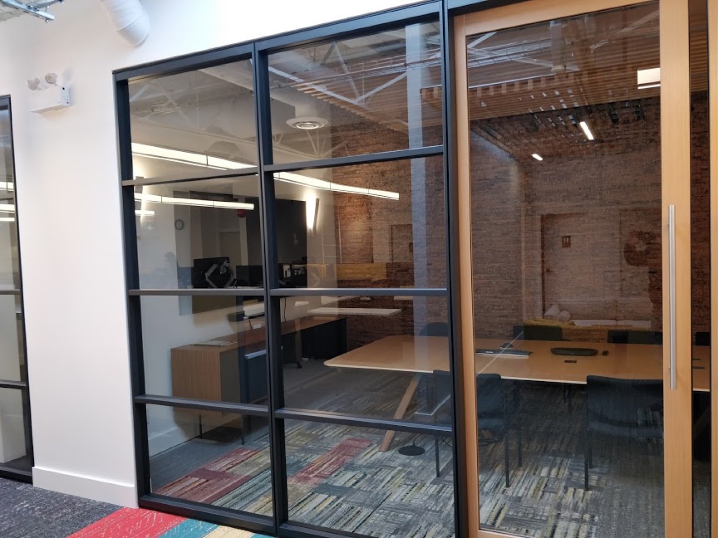 Glazed meeting-room area and commercial interior finishes