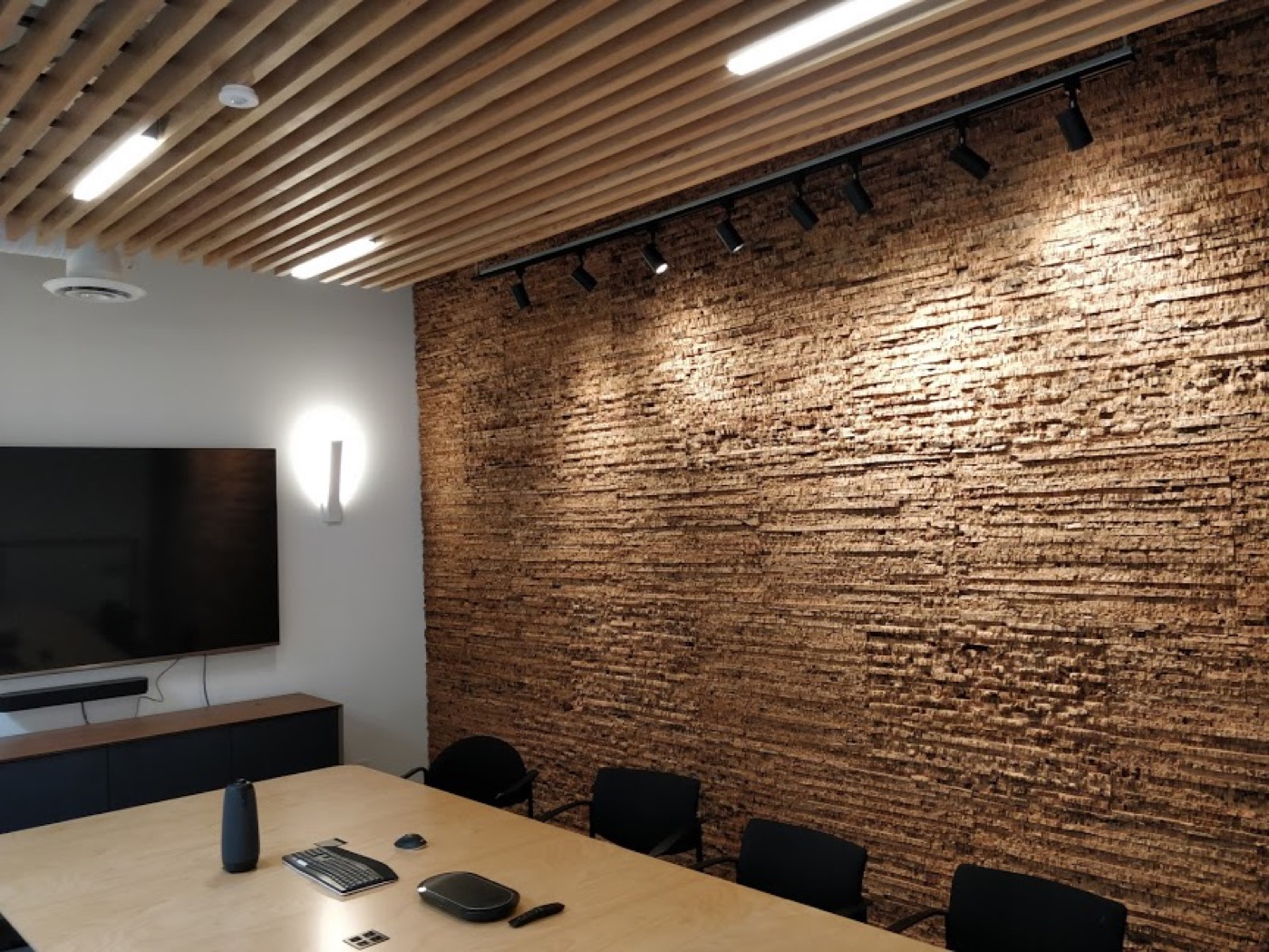 Meeting-room ceiling and lighting details in the completed Burquitlam strata renovation