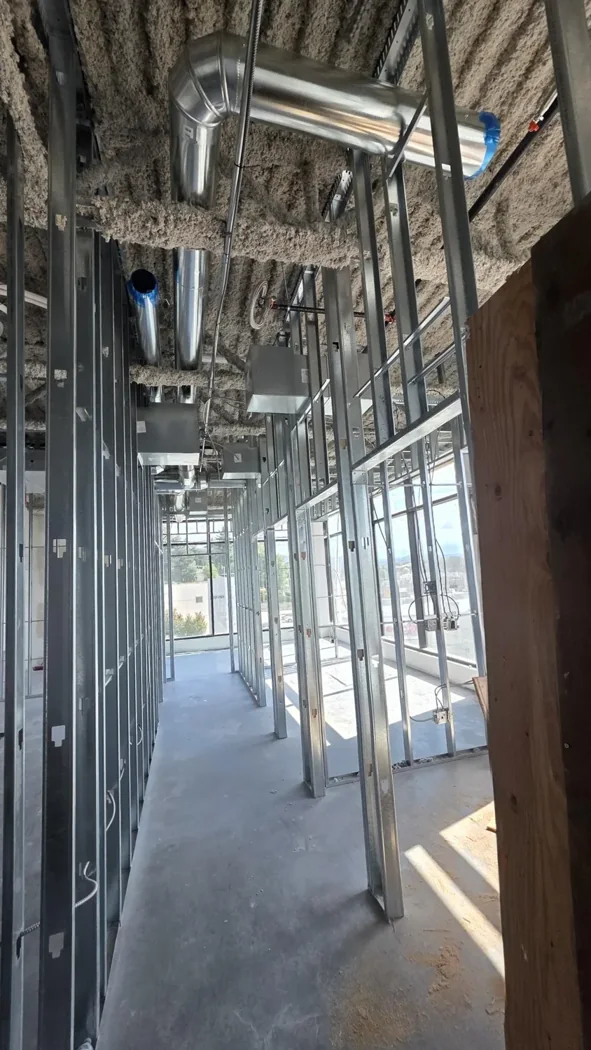 Office partitions before drywall, Mission — project photograph supplied by Mason McKenzie / Rambo